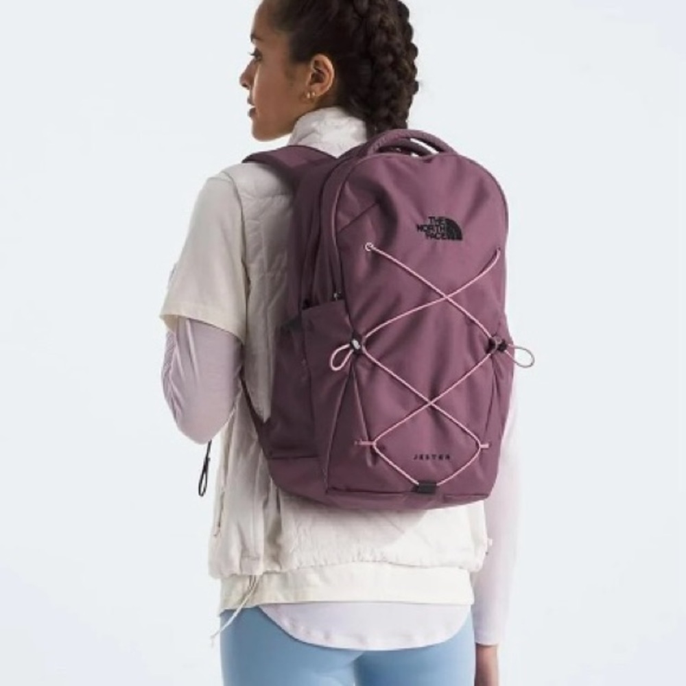 The North Face Women's Plum Purple Backpack with Pink Bungee
